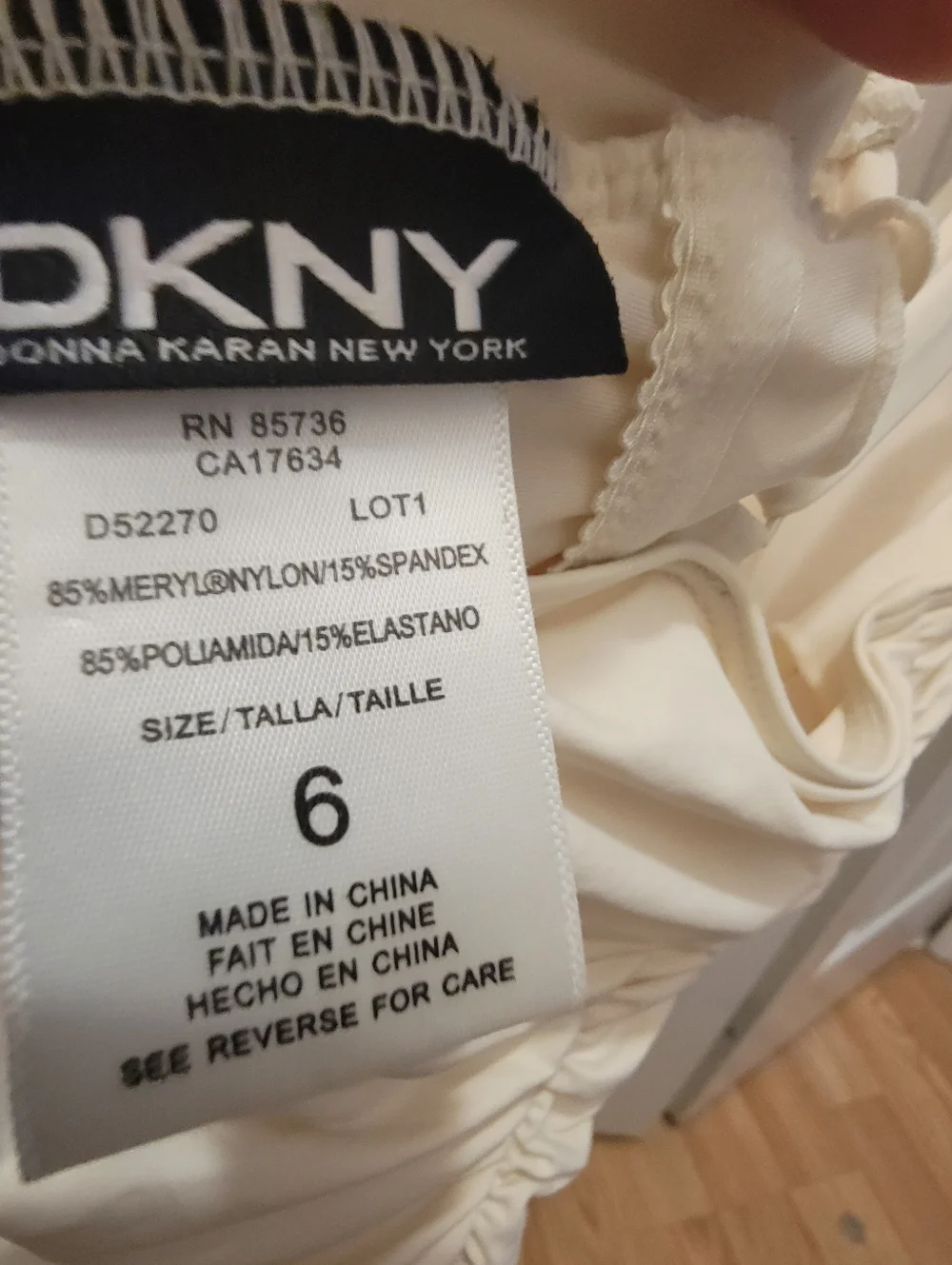 DKNYWomen's Crossover Tummy Control Ruched One-Piece Swimsuit - Picture 5 of 13